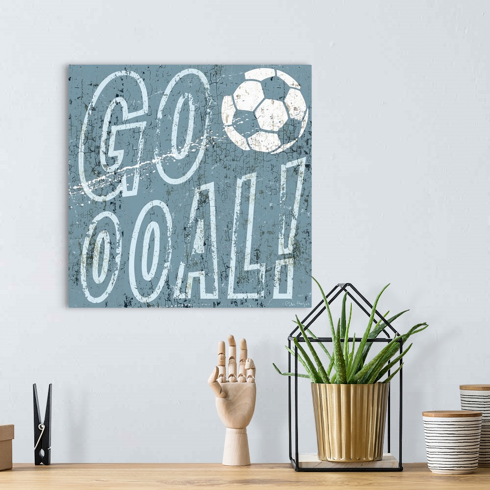 A bohemian room featuring Soccer scoring goal expression "Goooooal" with soccer ball in the typography.