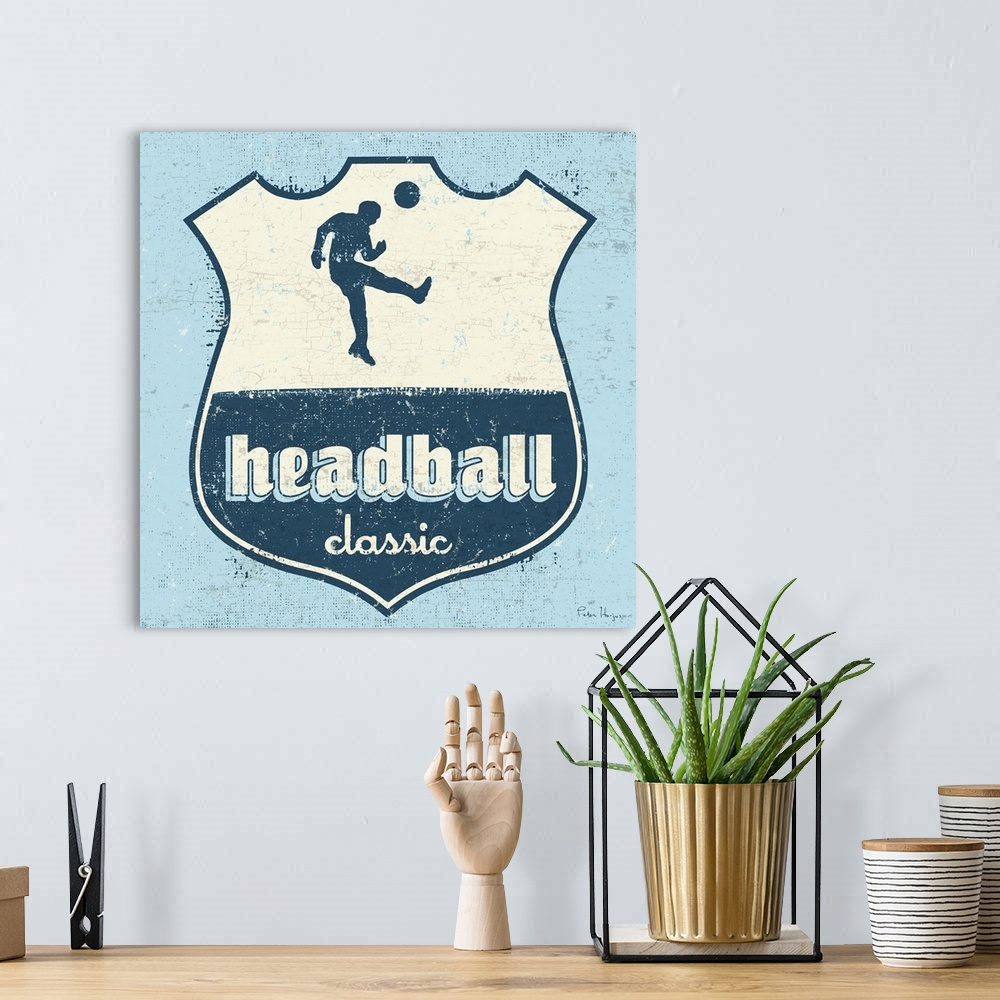 A bohemian room featuring Distressed  soccer logo of soccer player head-balling a soccer ball with the words Headball Classic.