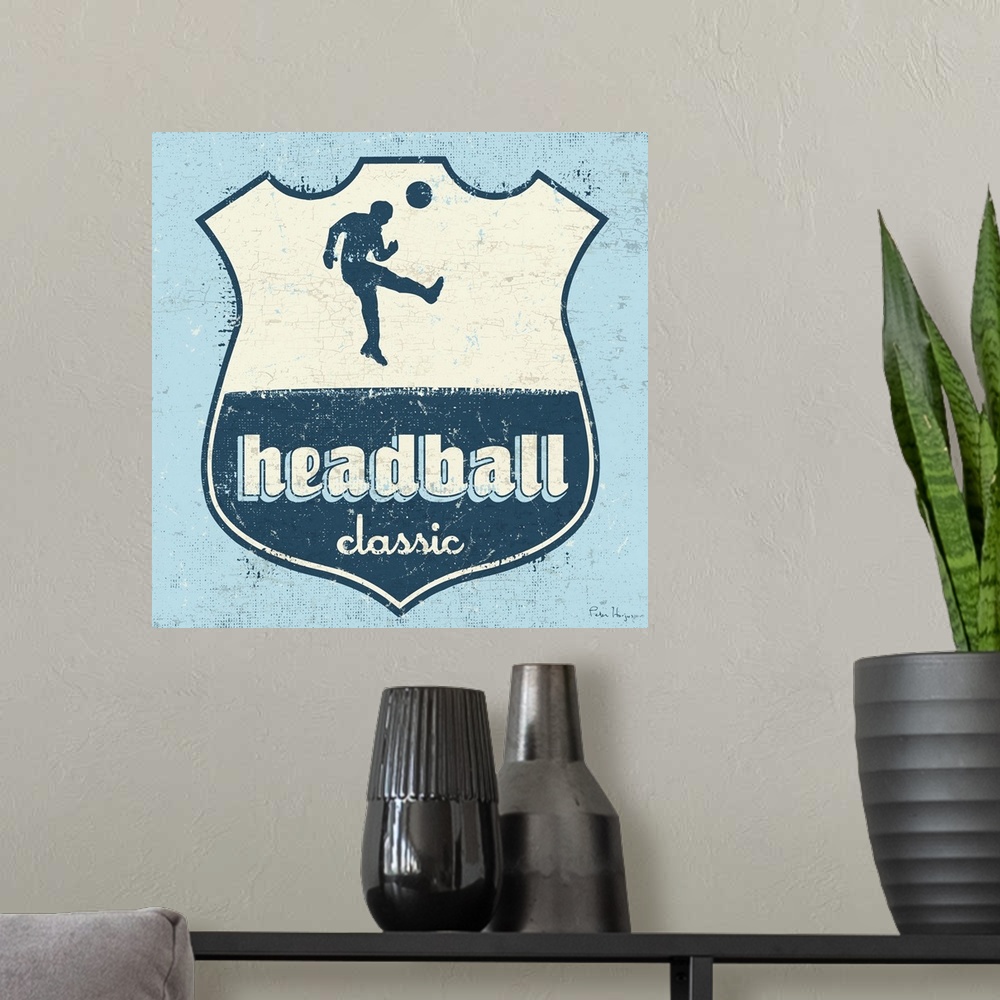 A modern room featuring Distressed  soccer logo of soccer player head-balling a soccer ball with the words Headball Classic.