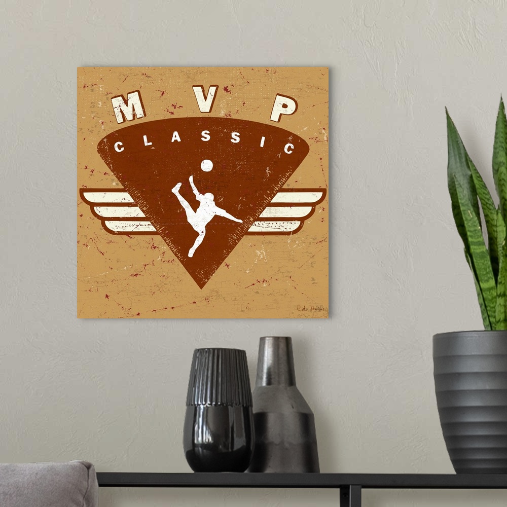 A modern room featuring Distressed  soccer logo of soccer player kicking soccer ball with the words MVP Classic.