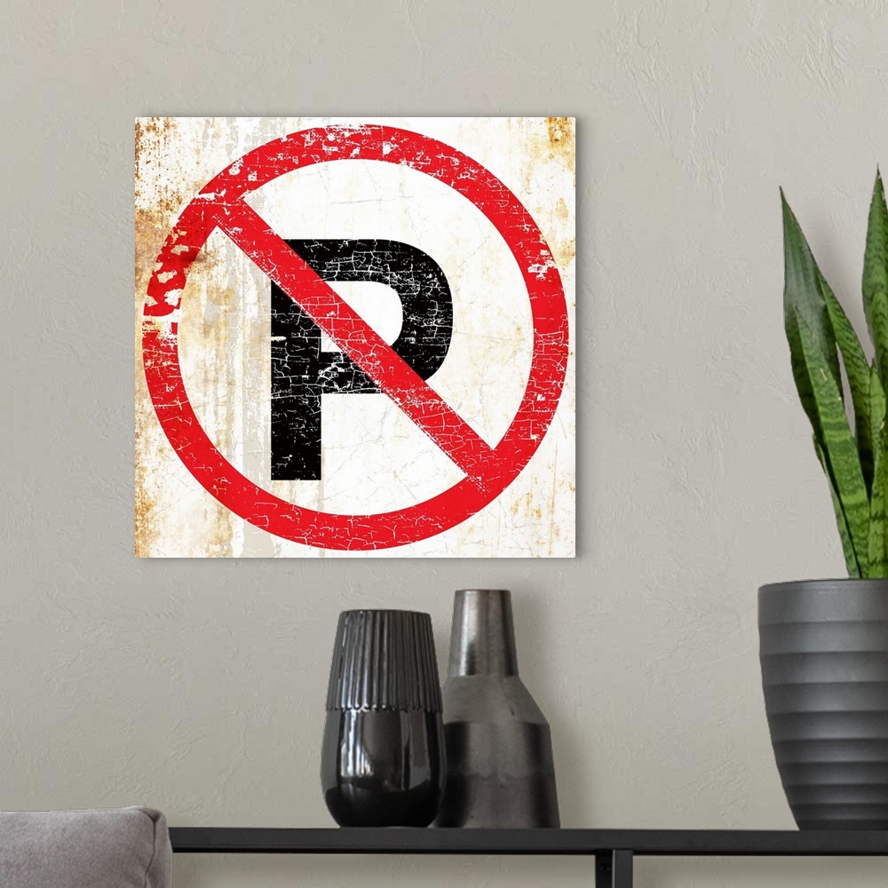 A modern room featuring A worn, distressed, cracked and rusty No Parking street sign.