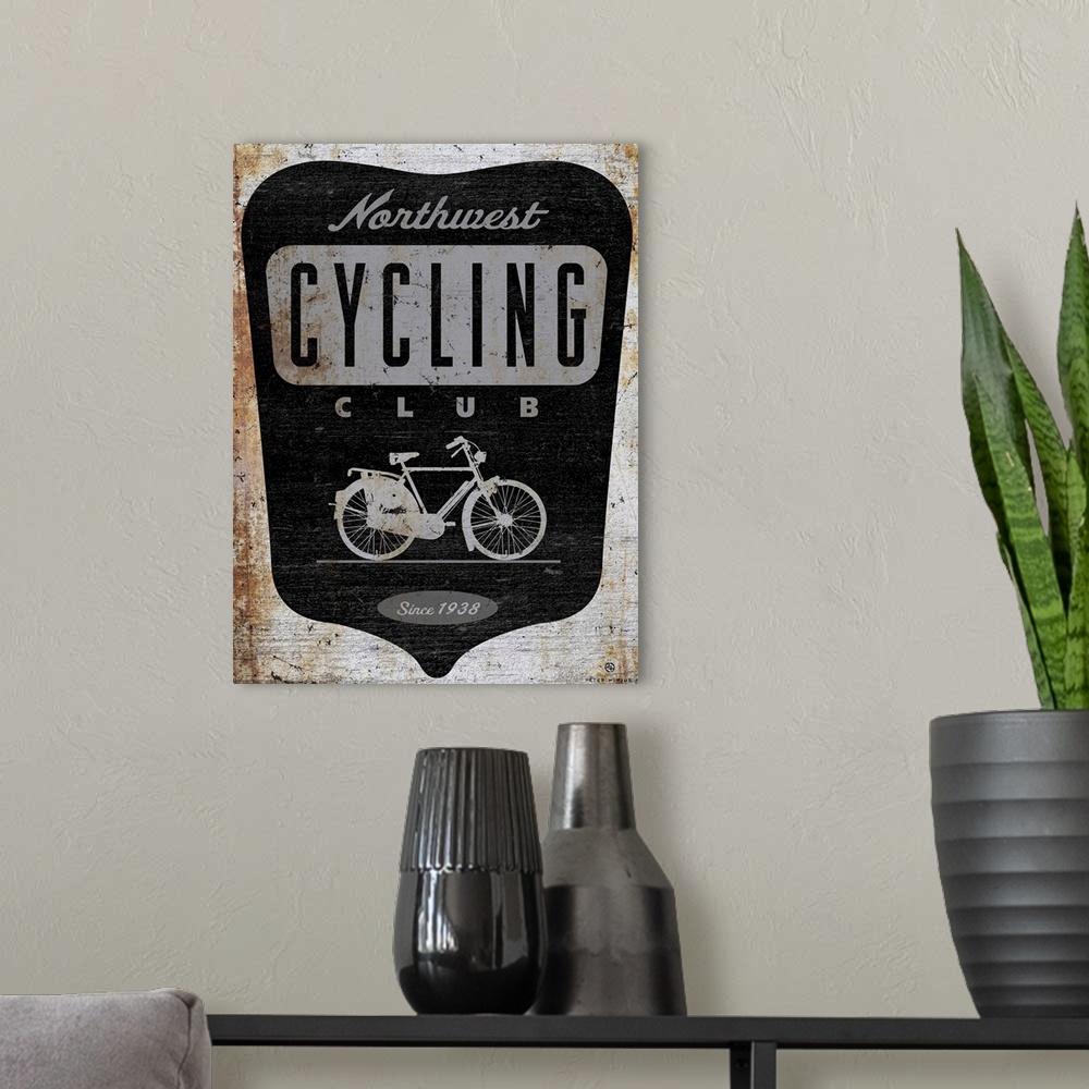 A modern room featuring Retro logo of the northwest cycling club depicting an old dutch opa bike.