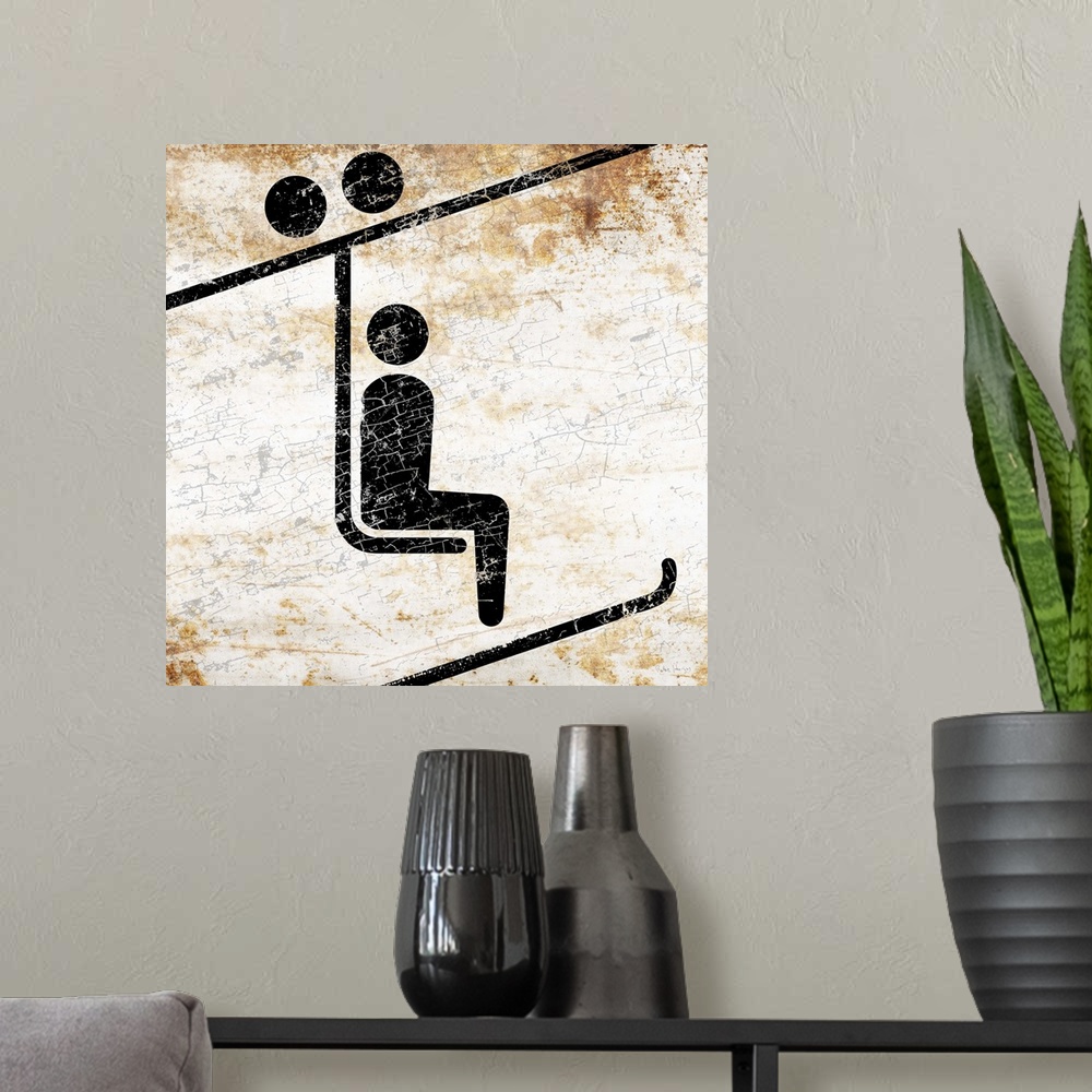 A modern room featuring A worn, distressed, cracked and rusty ski chairlift sign.