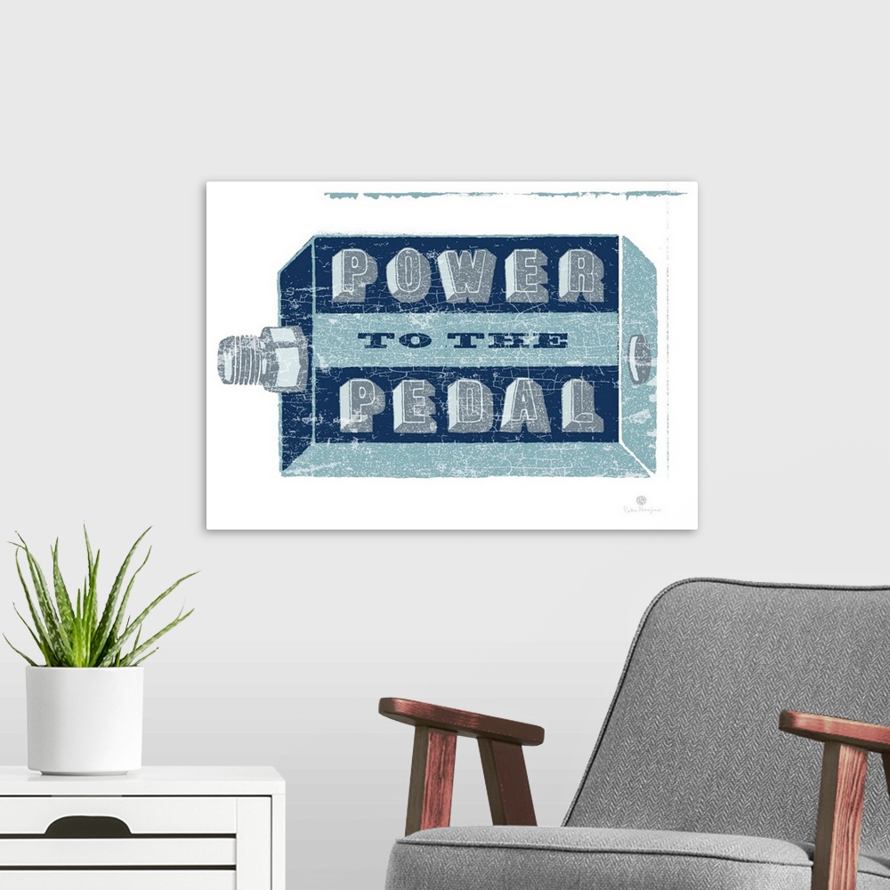 A modern room featuring A graphic image of a bike pedal with the words Power to the Pedal on the pedal.