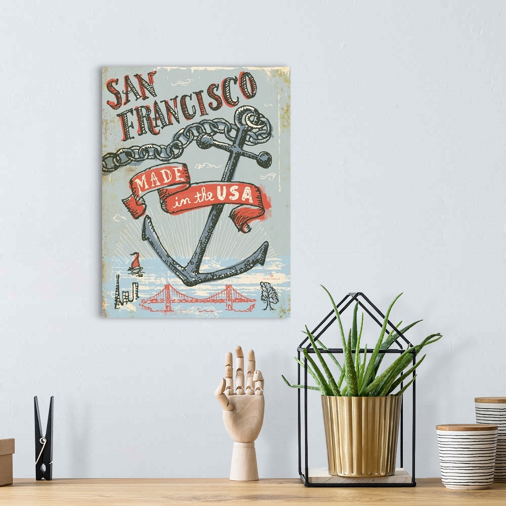 A bohemian room featuring Illustrated vintage, worn artwork of San Francisco's bridge and skyline, with an anchor and a rib...