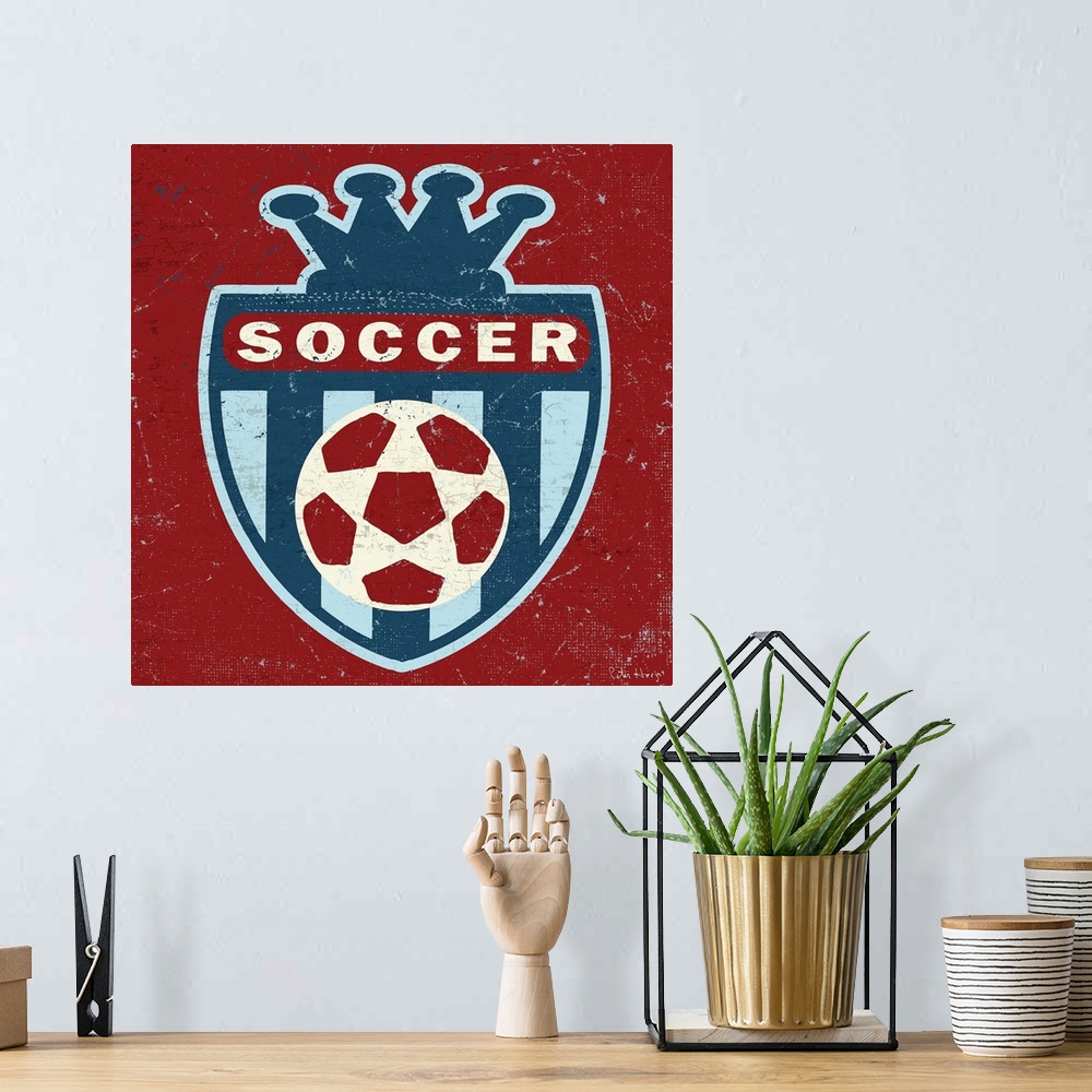 A bohemian room featuring Distressed  traditional soccer crest with soccer ball in the middle.