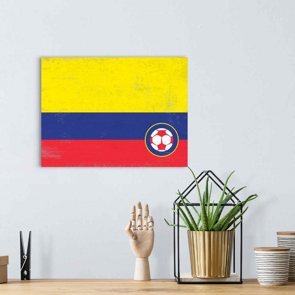 A bohemian room featuring Flag of Columbia with soccer crest with soccer ball.