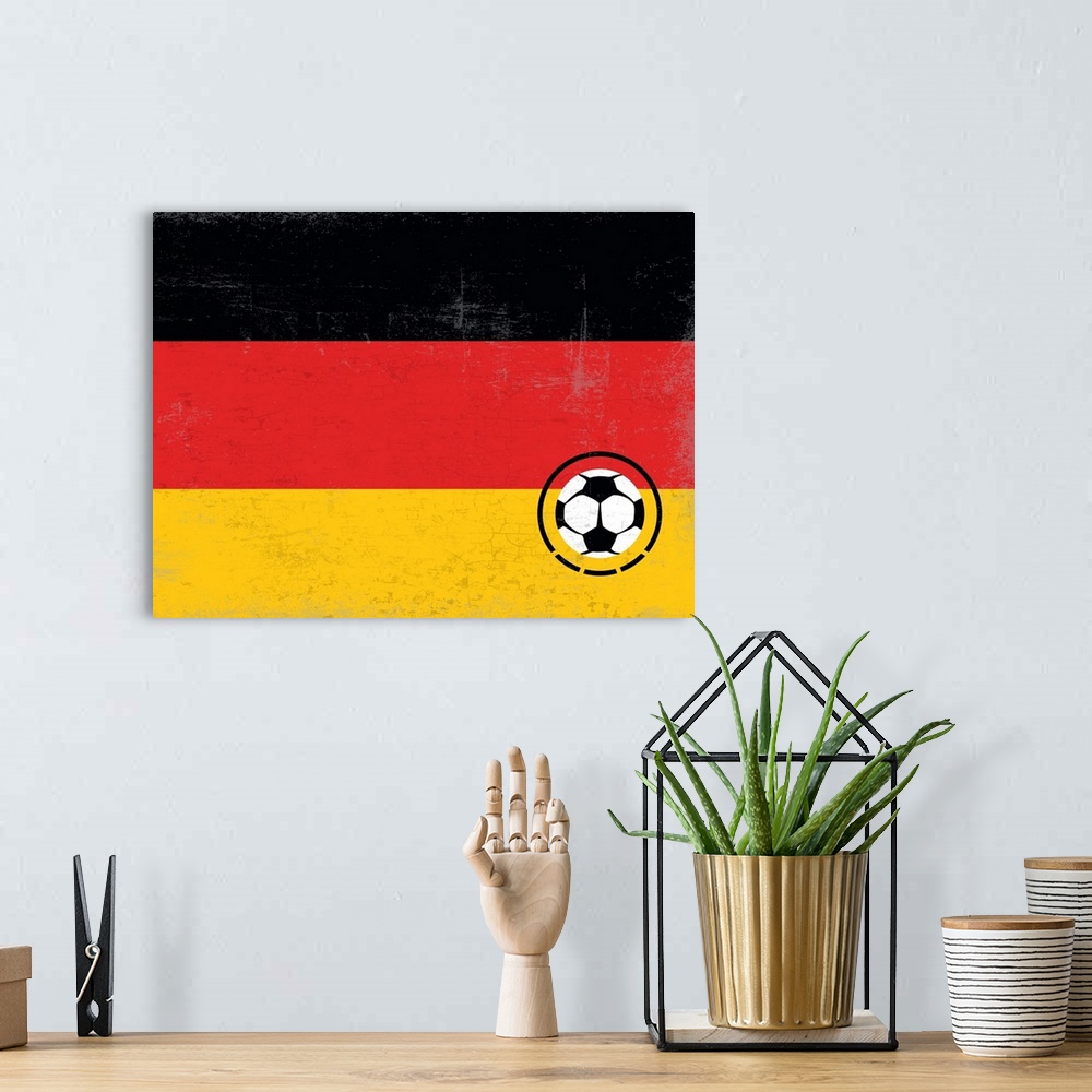A bohemian room featuring Flag of Germany with soccer crest with soccer ball.