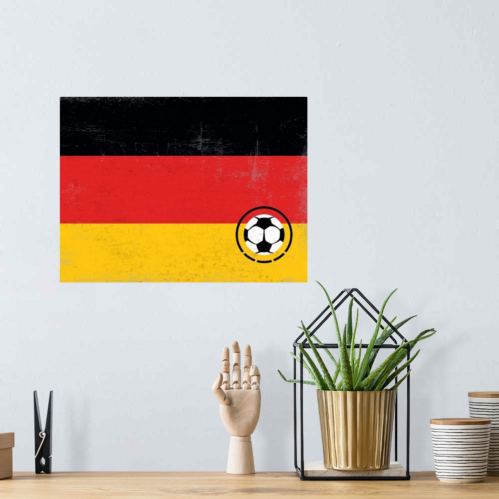 A bohemian room featuring Flag of Germany with soccer crest with soccer ball.
