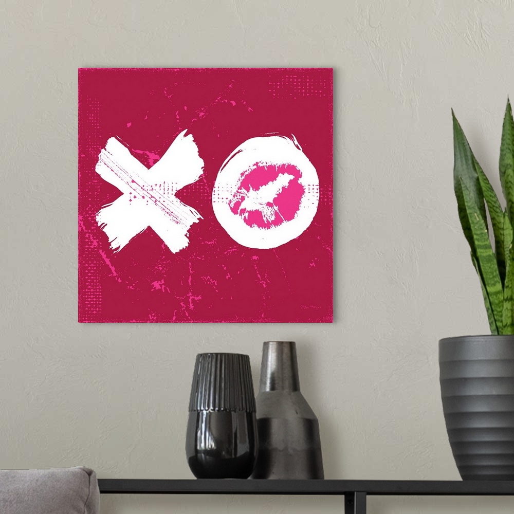 A modern room featuring A large illustrated X and O signifying a big kiss and a hug.