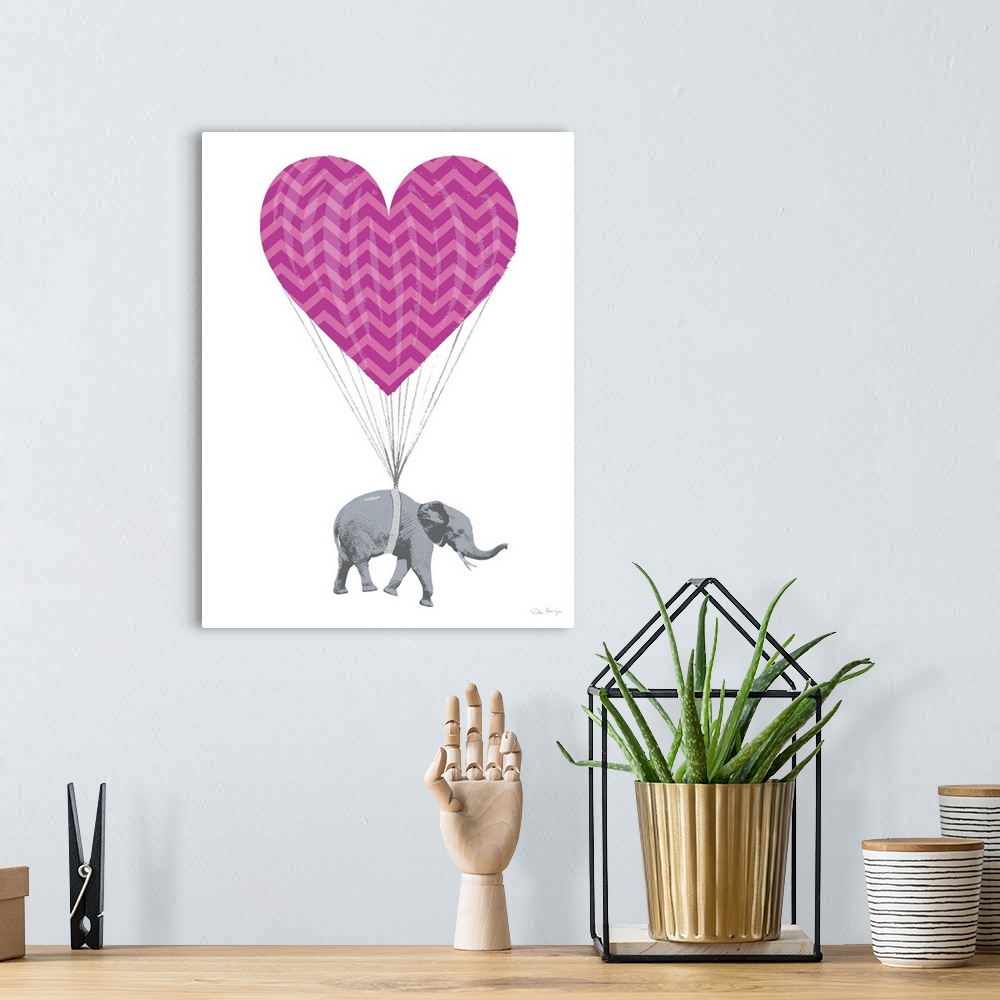 A bohemian room featuring Graphic art of an elephant paratrooper with a parachute in the shape of a love heart.