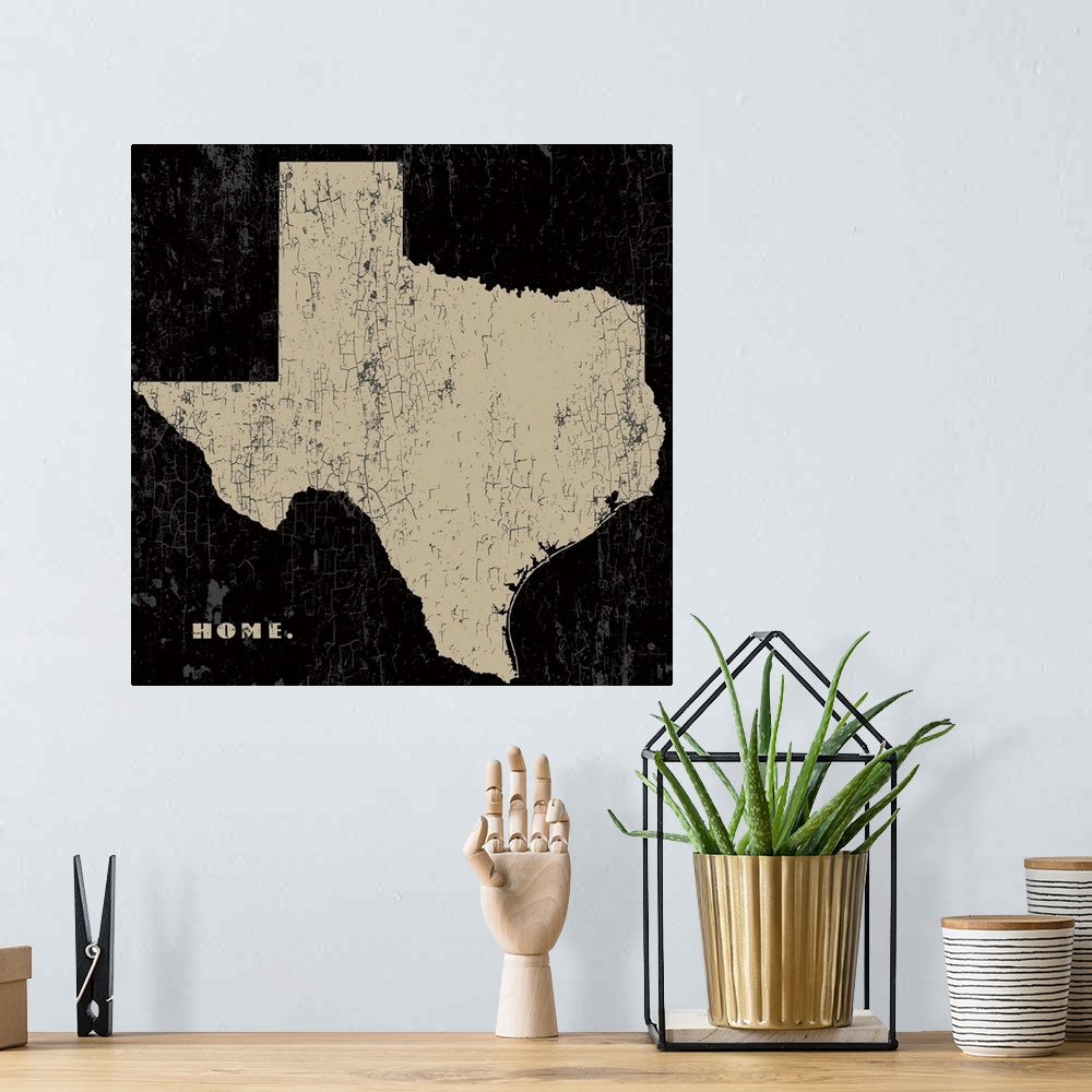 A bohemian room featuring Distressed wall art graphic art of the state of Texas with the word home in the lower left corner...
