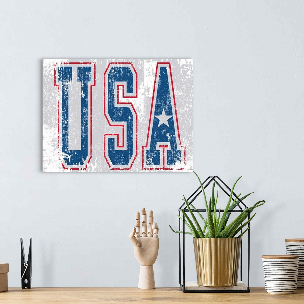 A bohemian room featuring Distressed letters USA in red, white and blue on a white and rust background.