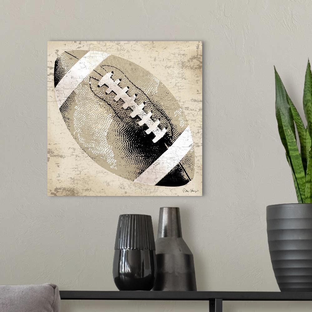 A modern room featuring Vintage style wall art of an old distressed football on tan and sepia background.
