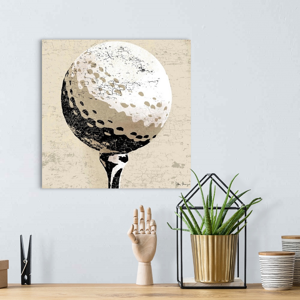A bohemian room featuring Vintage style wall art of an old distressed golfball on tan and sepia background.