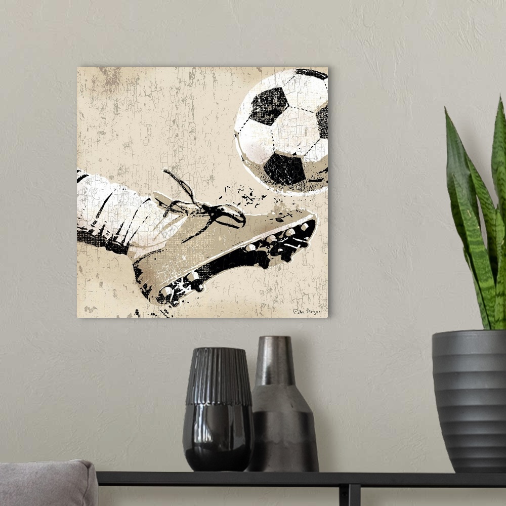 A modern room featuring Vintage style wall art of an old distressed soccer cleat and foot striking soccer ball on tan and...