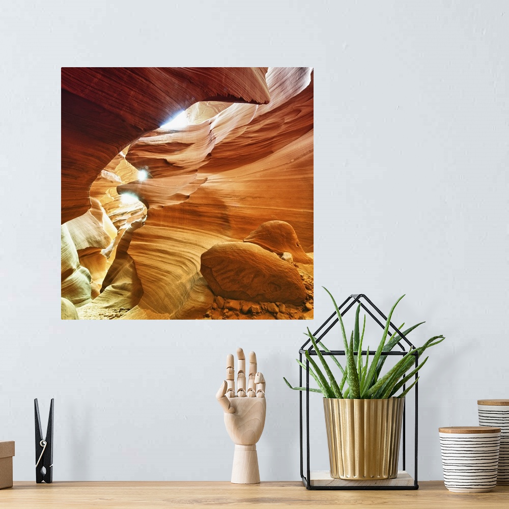 A bohemian room featuring The stunning natural curves and edges of Antelope Canyon.