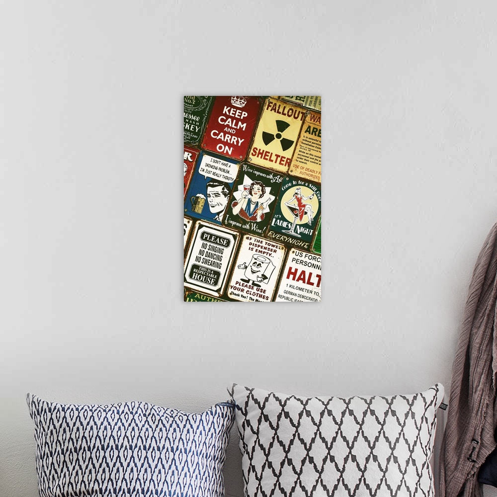 A bohemian room featuring Souvenir metal signs for sale in London, featuring sarcastic phrases and iconic images.