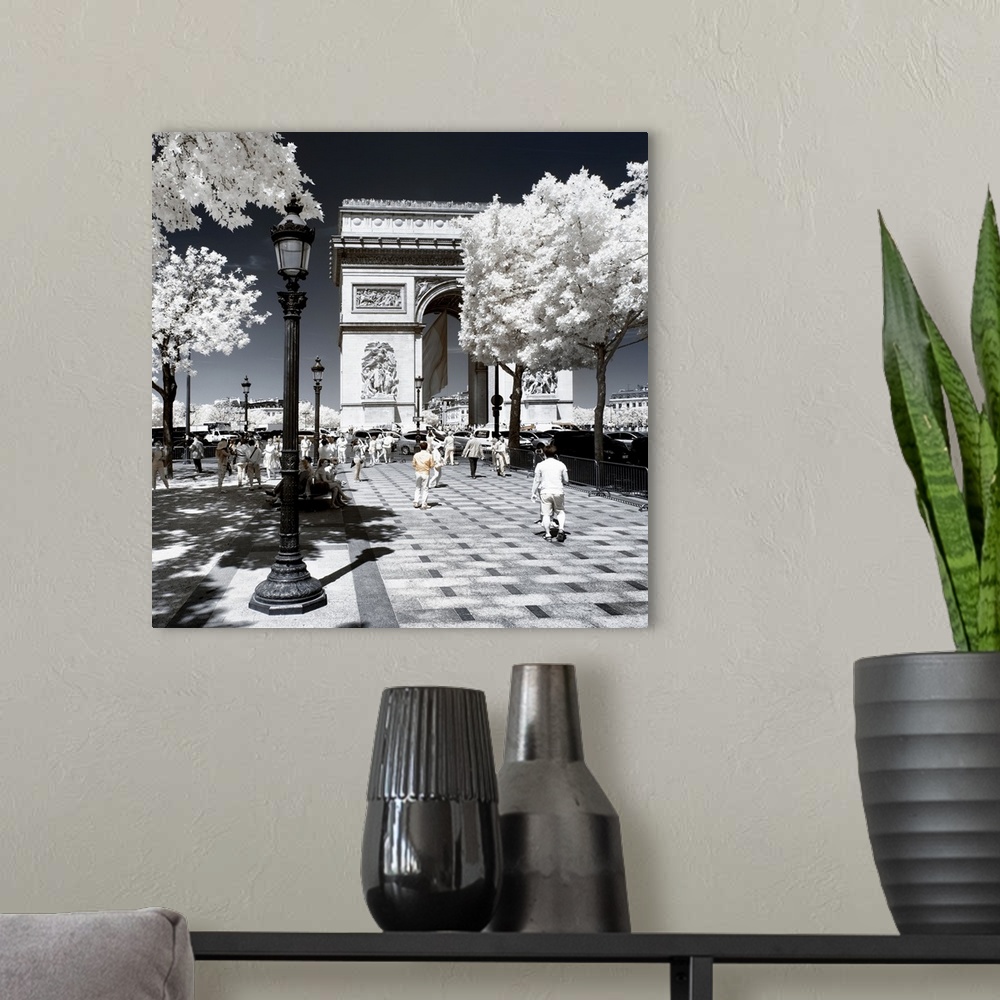 A modern room featuring A view of the Arc de Triomphe in Paris, made in infrared mode in summer. The vegetation is white ...