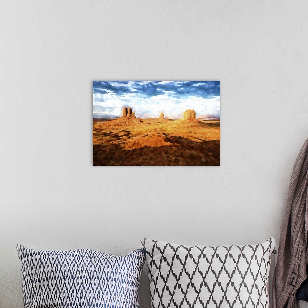 A bohemian room featuring A photograph of a desert landscape with a painterly effect.