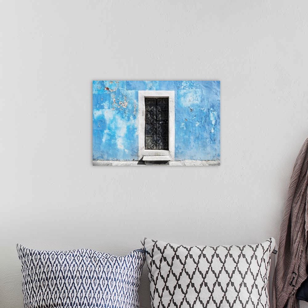 A bohemian room featuring Photograph of a blue exterior wall with a white doorway in Mexico. From the Viva Mexico Collection.