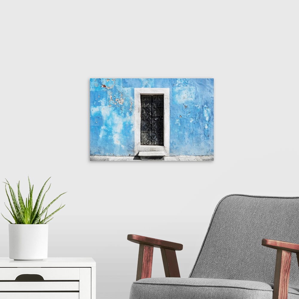 A modern room featuring Photograph of a blue exterior wall with a white doorway in Mexico. From the Viva Mexico Collection.
