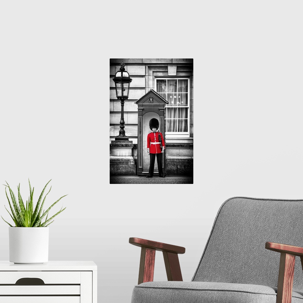 A modern room featuring Photo with selective color of a guard in traditional uniform at Buckingham Palace in London, Engl...