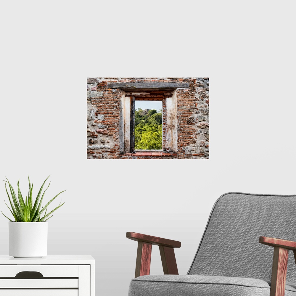 A modern room featuring View of the ancient Mayan City of Calakmul, Mexico, framed through a stony, brick window. From th...