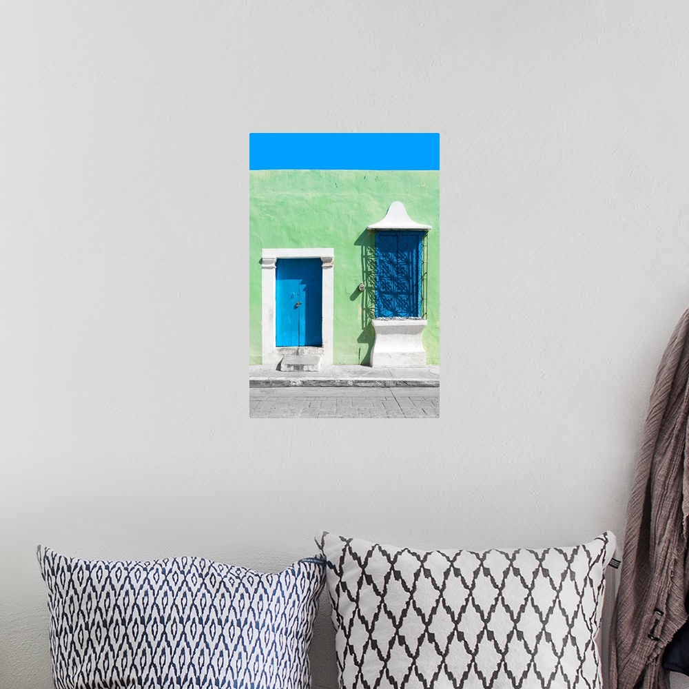 A bohemian room featuring Photograph of a green exterior wall with a blue door and window in Campeche, Mexico. From the Viv...