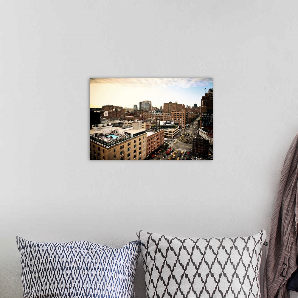A bohemian room featuring Fine art photo of the New York City skyline, showing tall buildings and busy streets.