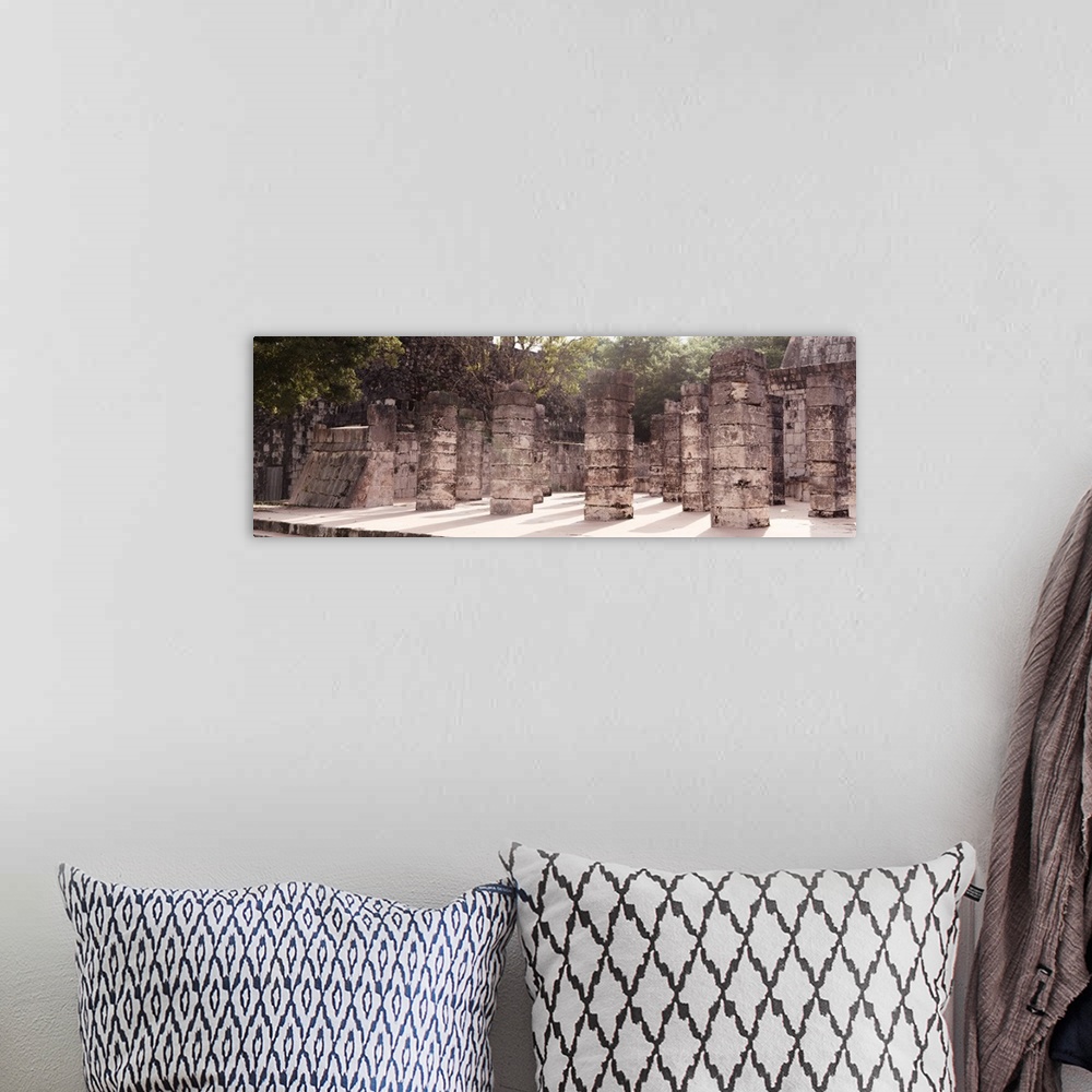 A bohemian room featuring Panoramic photograph of the Once Thousand Mayan Columns at Chichen Itza, Mexico. From the Viva Me...