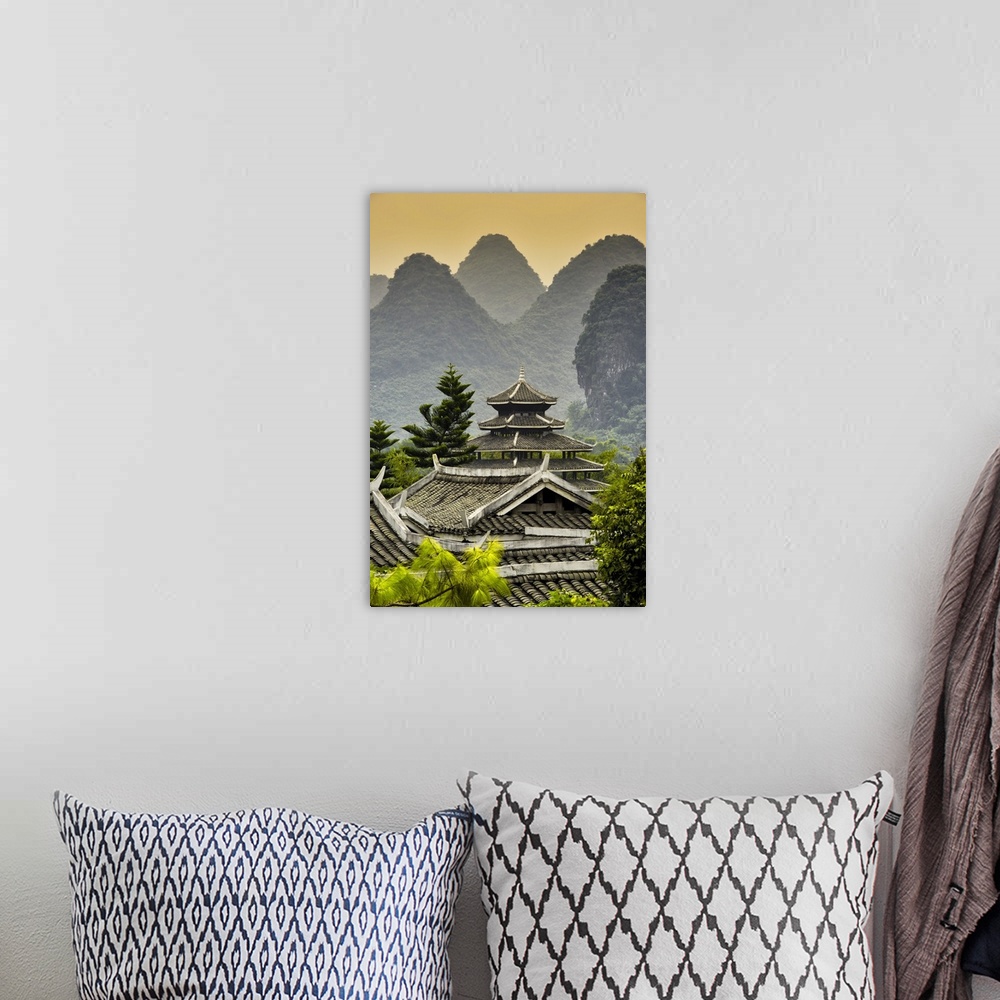 A bohemian room featuring Chinese Buddhist Temple with Karst Mountains at Sunset, China 10MKm2 Collection.