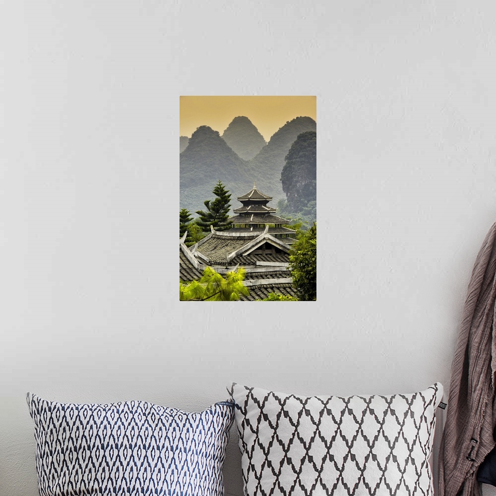 A bohemian room featuring Chinese Buddhist Temple with Karst Mountains at Sunset, China 10MKm2 Collection.