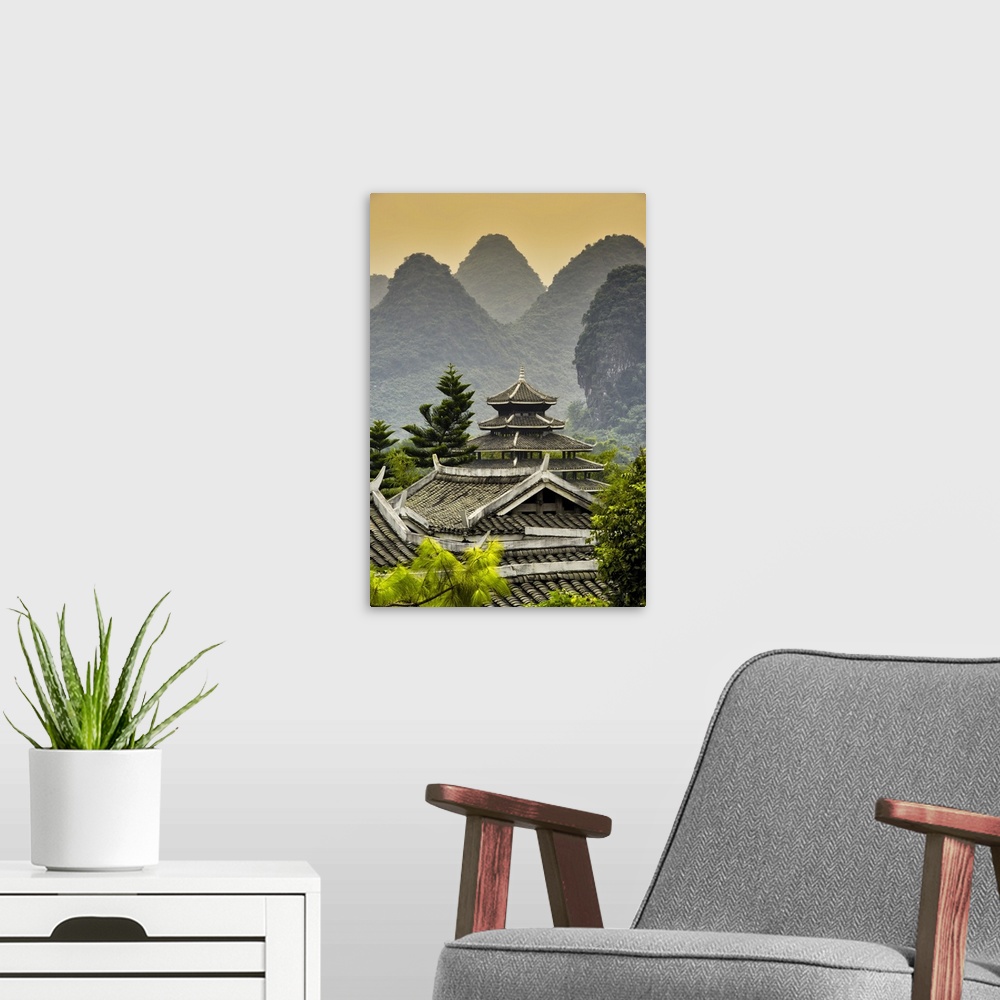 A modern room featuring Chinese Buddhist Temple with Karst Mountains at Sunset, China 10MKm2 Collection.