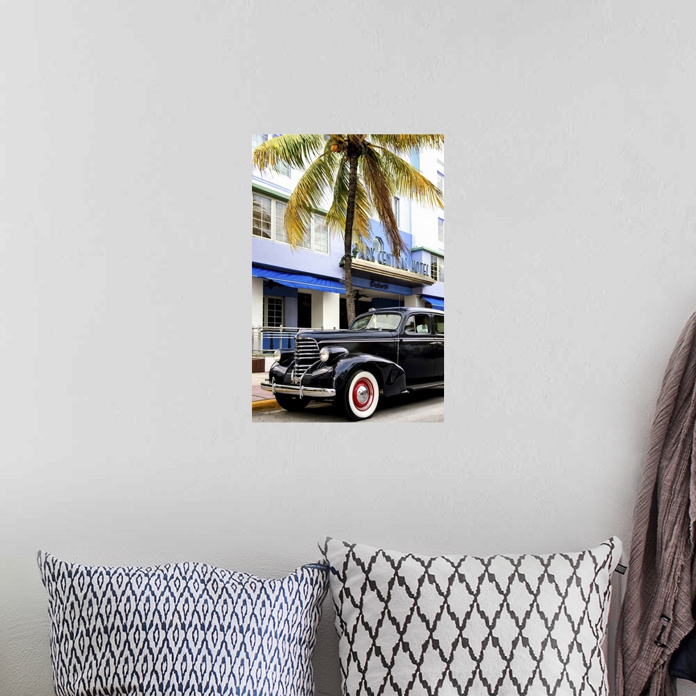 A bohemian room featuring Photograph of a classic car in Miami, Florida, under a palm tree.
