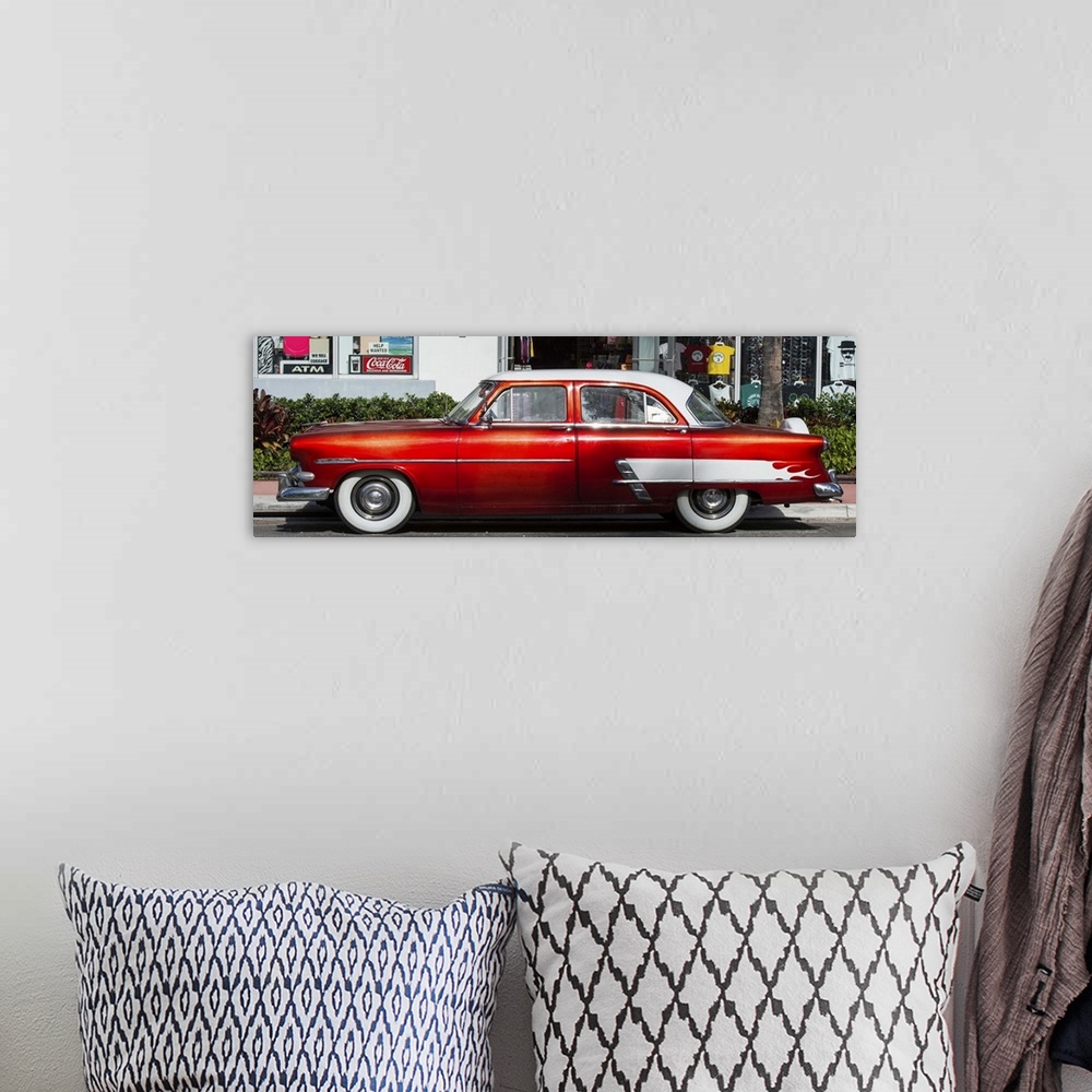A bohemian room featuring A bright red vintage car in Miami, Florida.