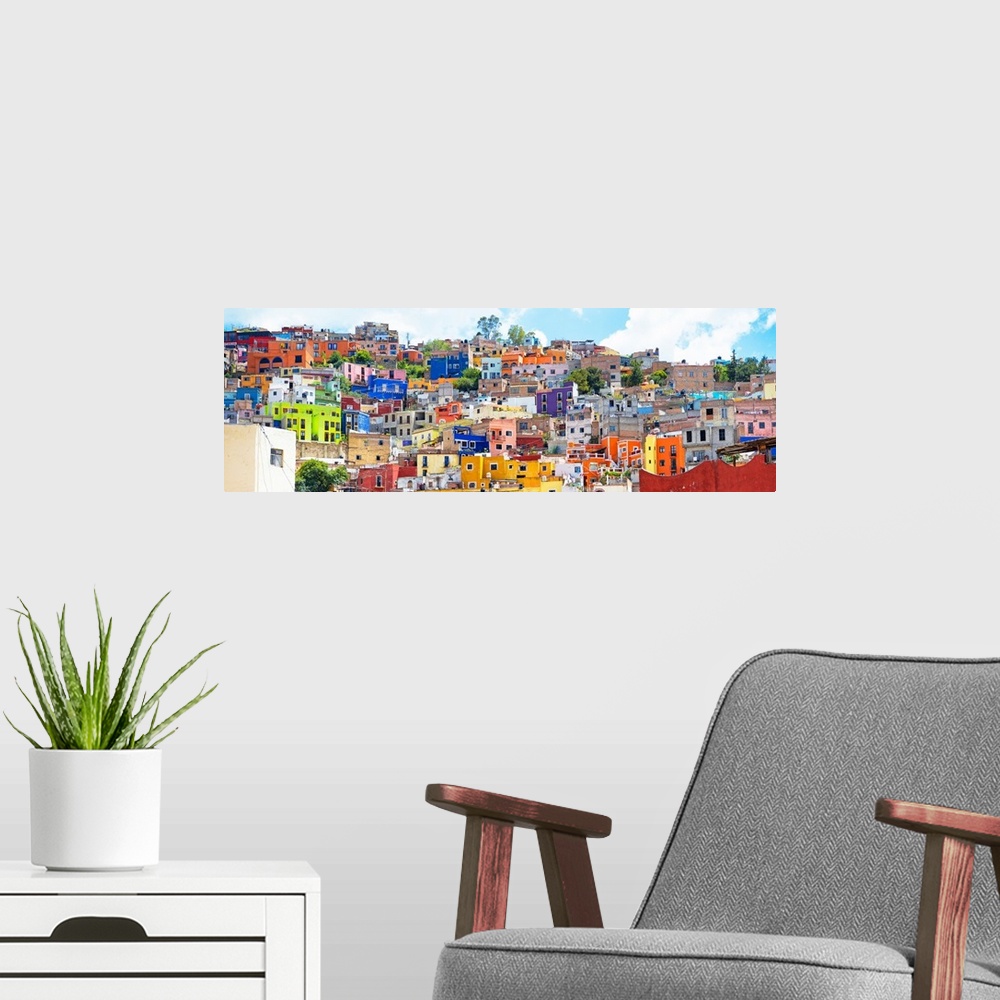 A modern room featuring Colorful panoramic photograph of a cityscape in Guanajuato, Mexico. From the Viva Mexico Panorami...