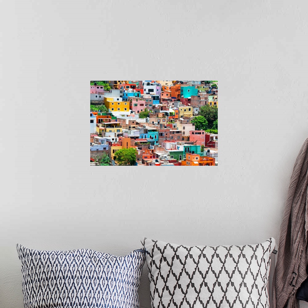 A bohemian room featuring Colorful cityscape photograph of Guanajuato, Mexico. From the Viva Mexico Collection.