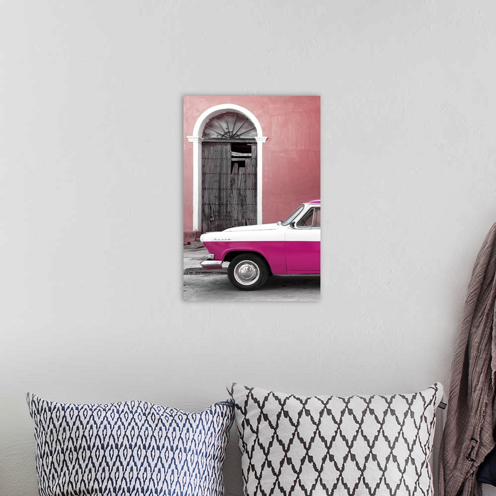 A bohemian room featuring Photograph of the front of a vintage pink and white car outside of a pink building with a broken ...