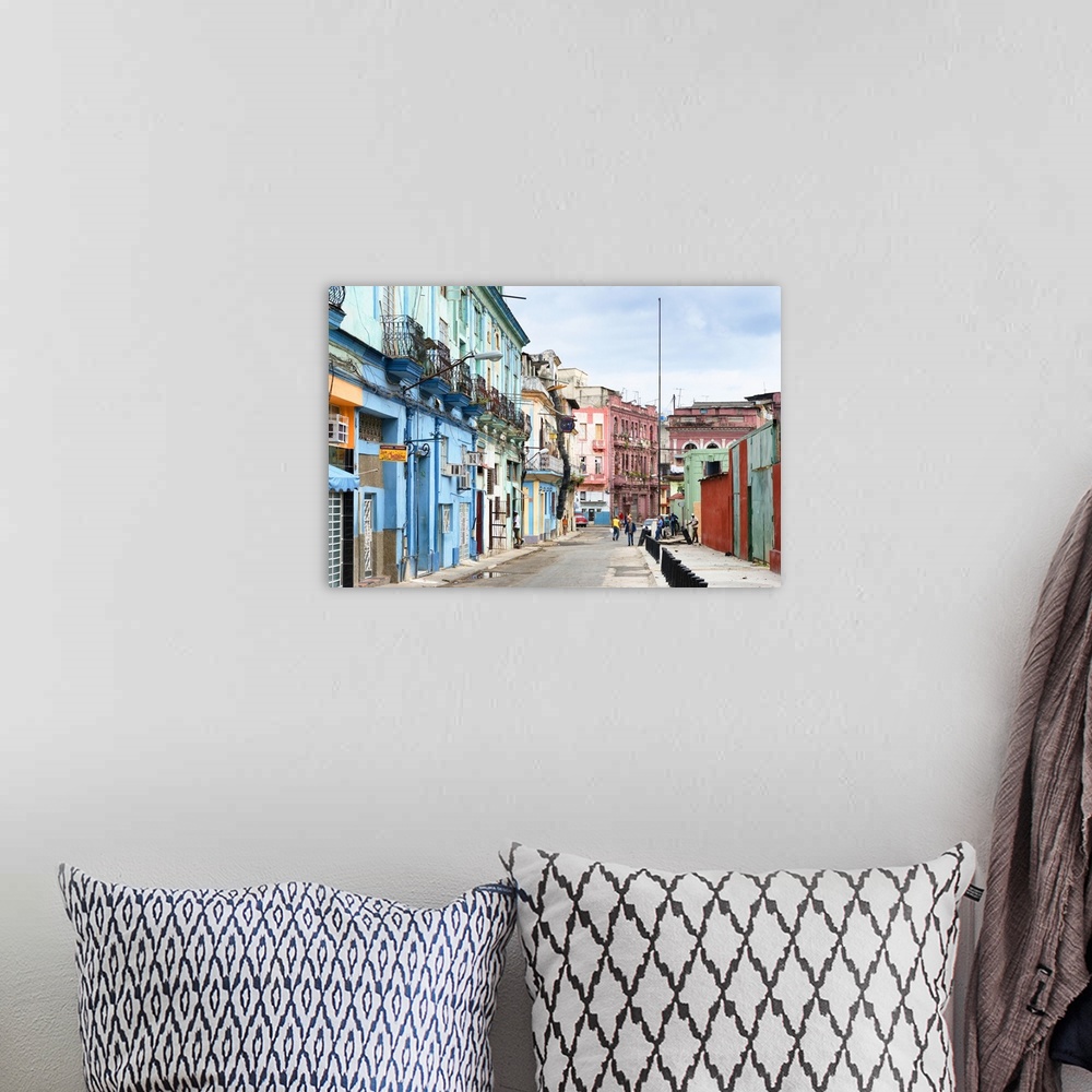 A bohemian room featuring Photograph of a streetscape in Havana, Cuba, highlighting the colorful architecture.