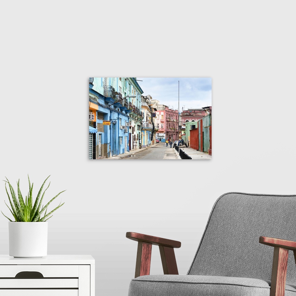A modern room featuring Photograph of a streetscape in Havana, Cuba, highlighting the colorful architecture.