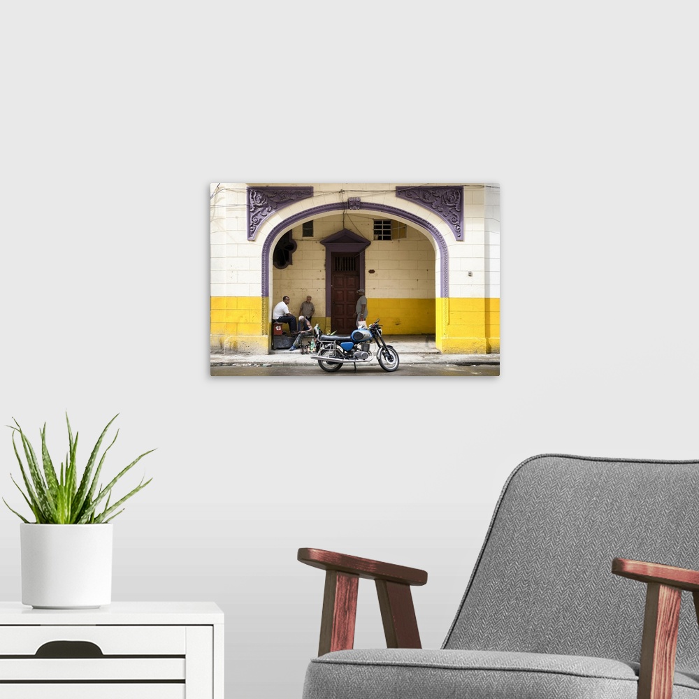 A modern room featuring Photograph of a blue motorcycle parked along a street in Havana with pretty purple architectural ...