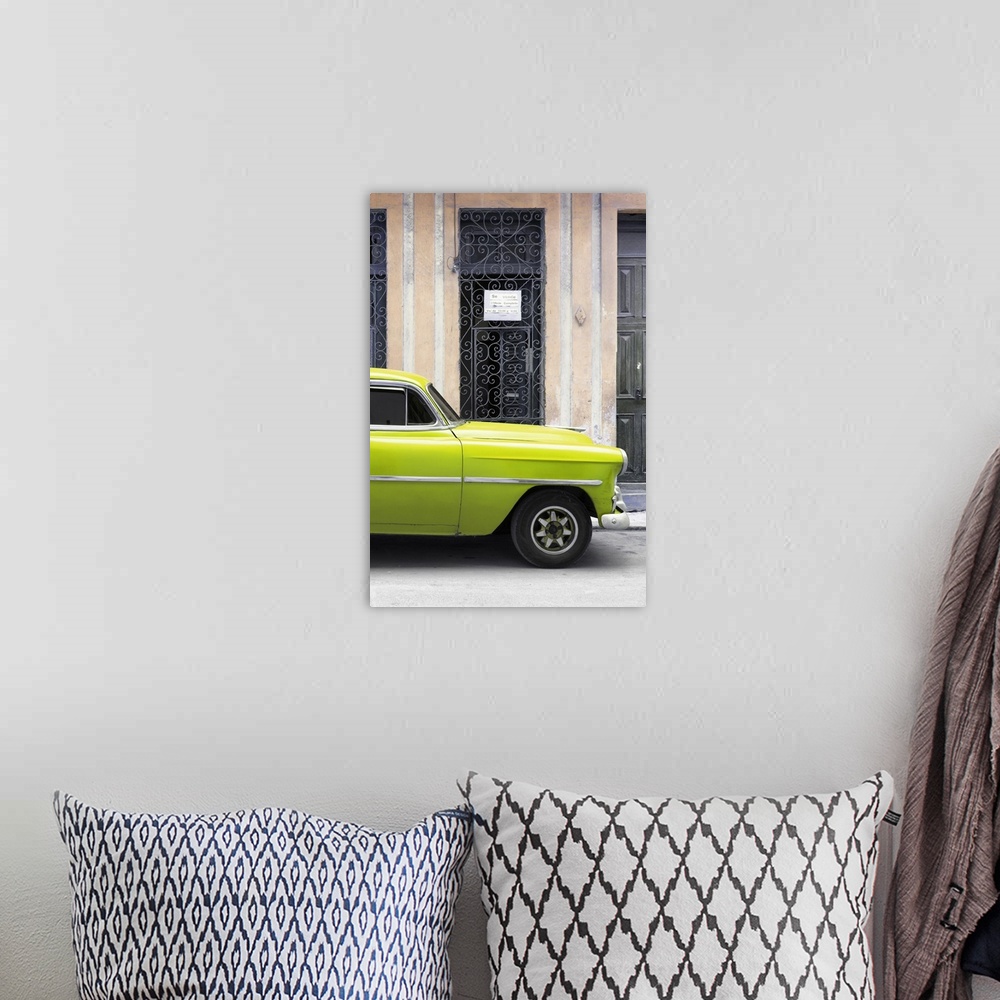 A bohemian room featuring Photograph of a lime green vintage car parked outside in the streets of Havana.