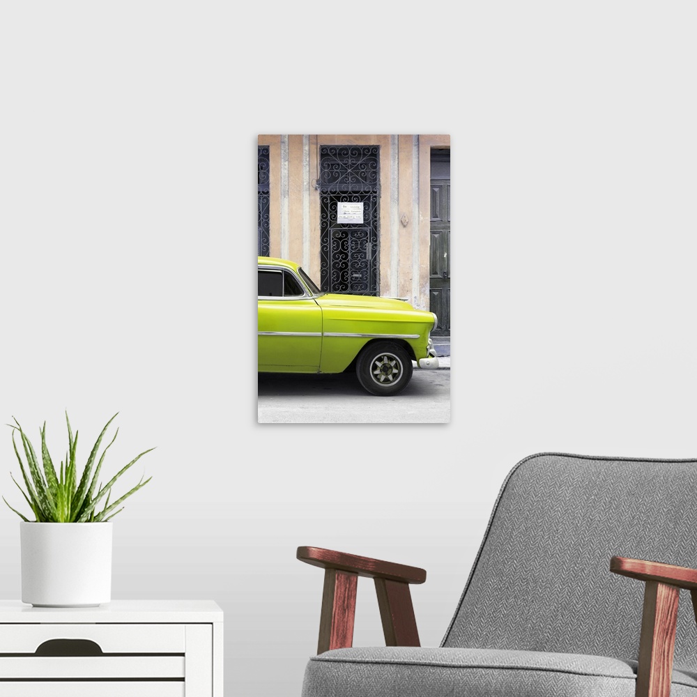A modern room featuring Photograph of a lime green vintage car parked outside in the streets of Havana.