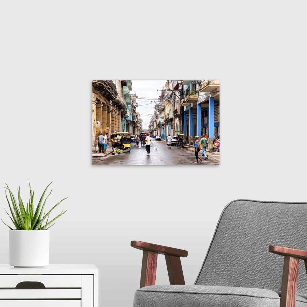 A modern room featuring Photograph of a busy street scene in Havana, Cuba.