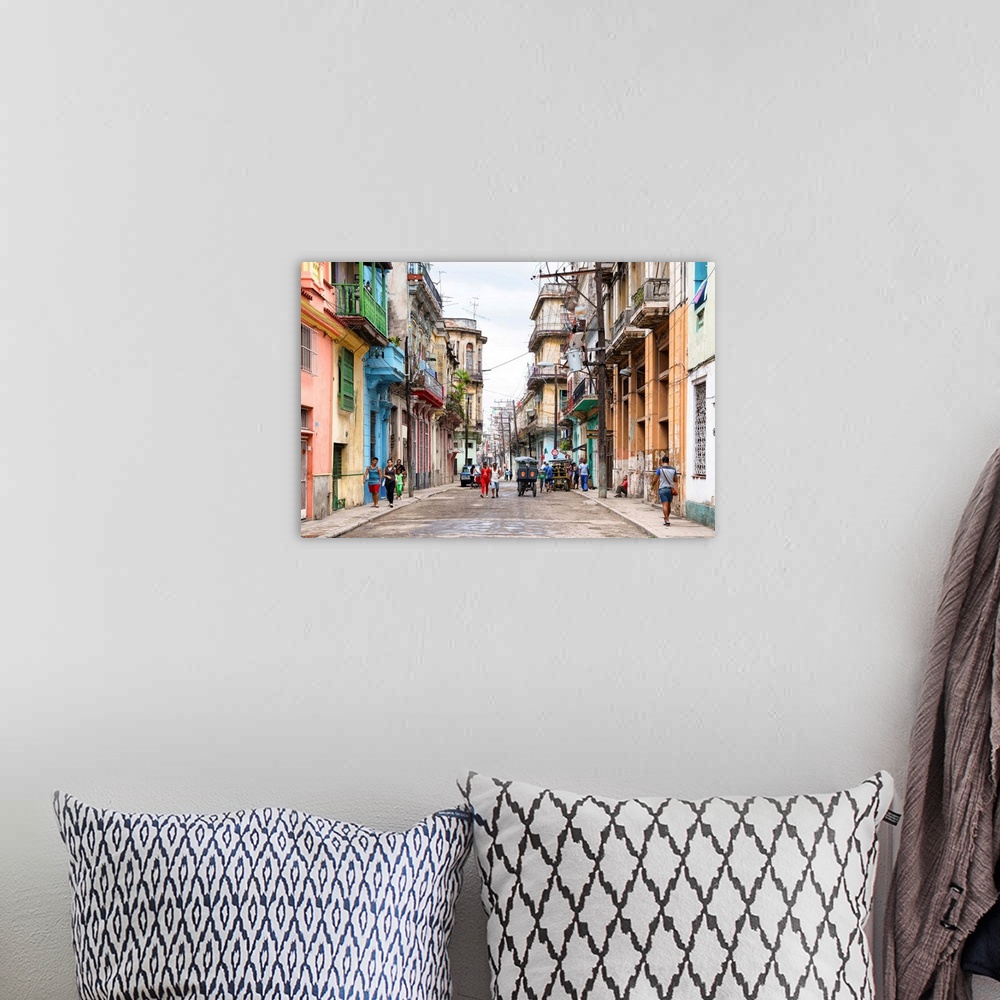 A bohemian room featuring Photograph of a busy street scene in Havana, Cuba with colorful buildings lining the streets and ...