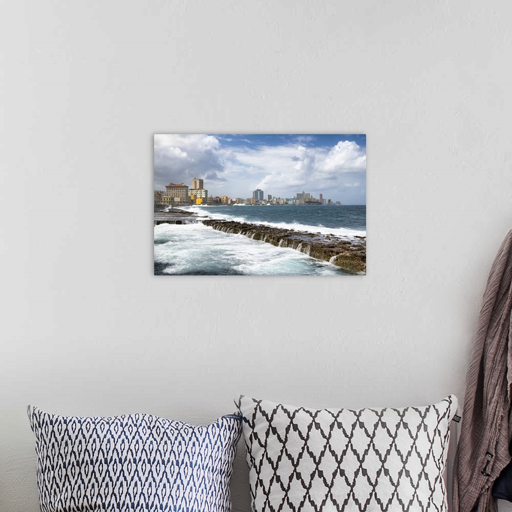 A bohemian room featuring Photograph of Malecon seawall with the city of Havana in the background.