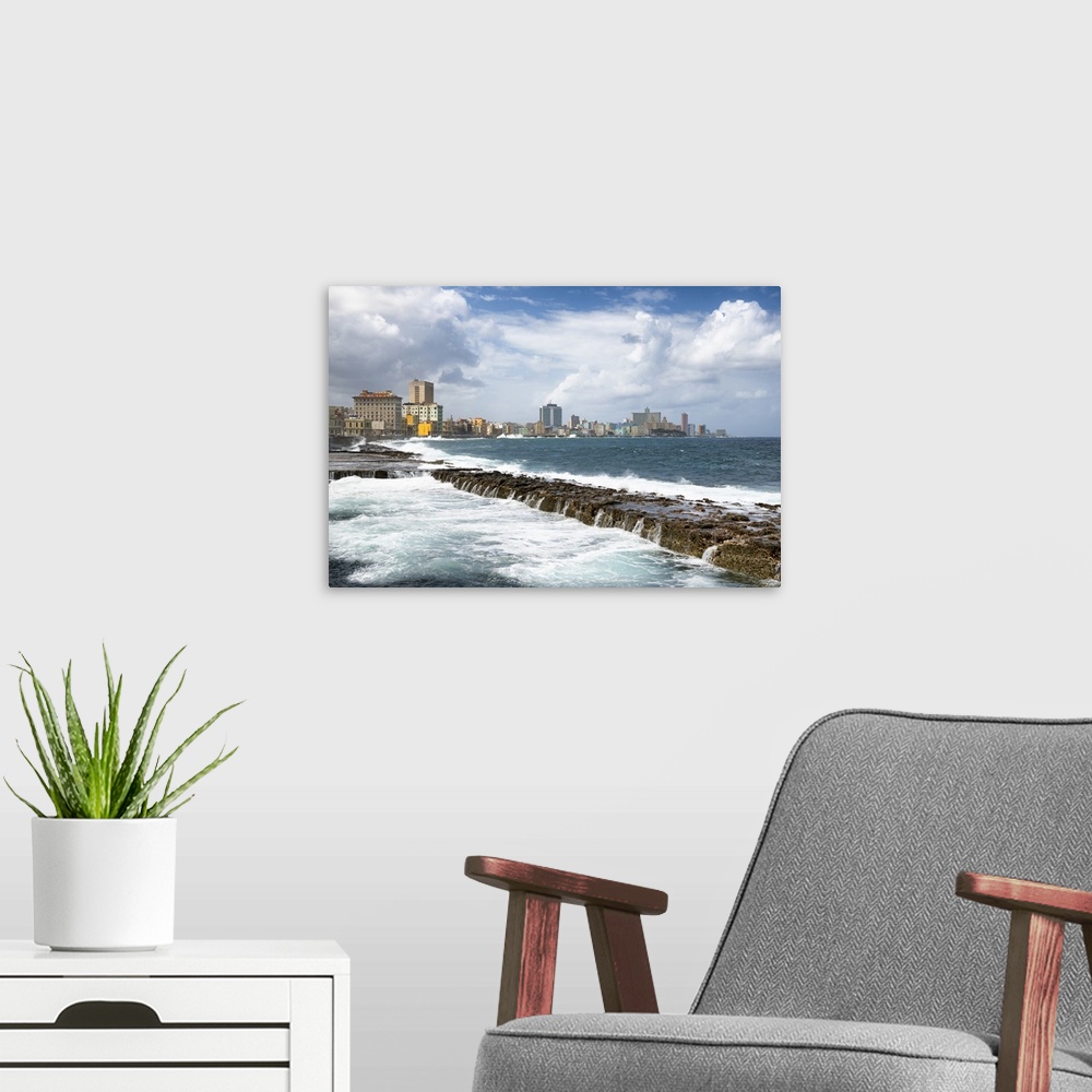 A modern room featuring Photograph of Malecon seawall with the city of Havana in the background.