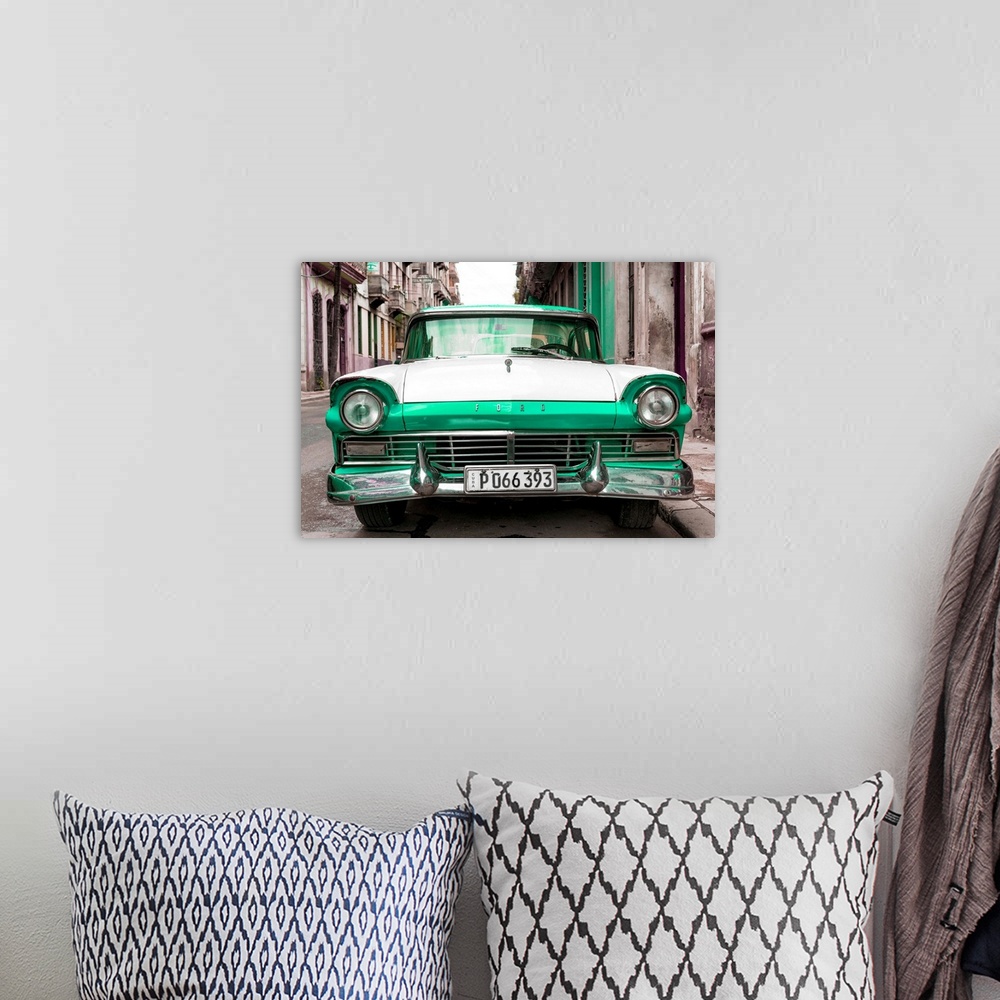 A bohemian room featuring Photograph of a vintage green and white Ford parked in downtown Havana.