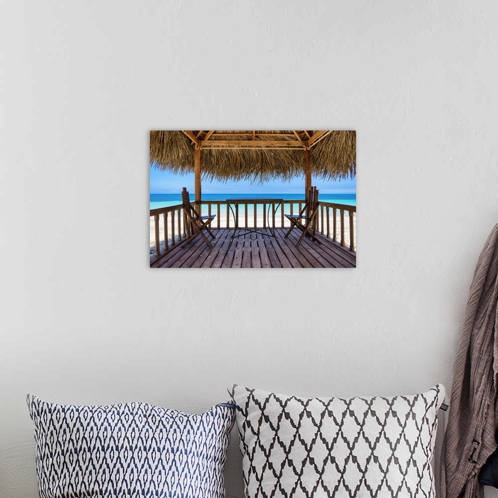 A bohemian room featuring Photograph taken from inside a relaxing cabana on the beach with the crystal blue ocean in the di...